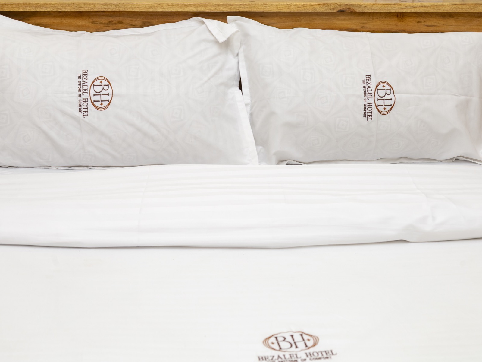 Pillows embroidered with the BH monogram